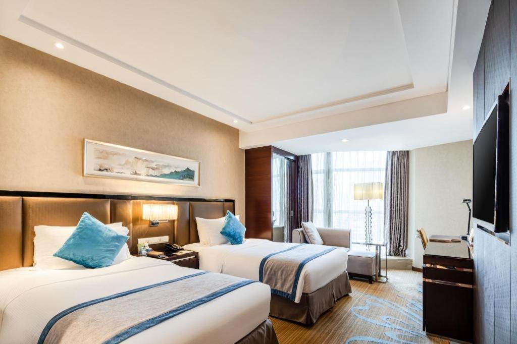 Chengdu Rising Butterfly Hotel Bagian luar foto